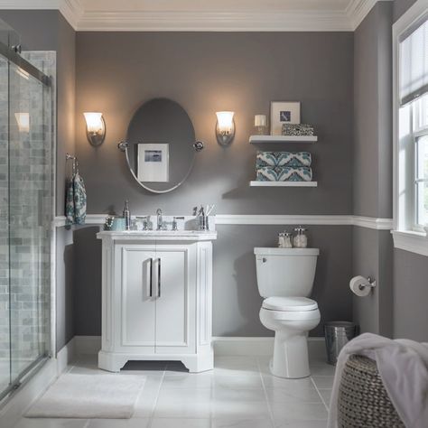 A pair of wall sconces perfectly frame this bathroom mirror. Select vanity lights based on the size of your bathroom and the amount of light needed. Bathroom Chair Rail, Benjamin Moore Bathroom Colors, Grey Bathroom Paint, Gray Bathroom Walls, Grey Bathroom Cabinets, Marble Bathrooms, Grey And White Bathroom, Bathroom Chair, Small Bathroom Colors