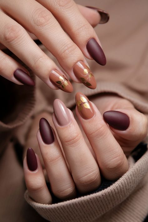 Embrace the beauty of autumn with these stunning almond-shaped fall nail ideas! Picture warm caramel tones intertwined with deep burgundy and sparkling gold accents, perfectly capturing the essence of the season. This chic nail design not only complements the cozy vibes of fall but also adds a touch of elegance to any outfit. Get ready to turn heads with nails that are as stylish as your favorite autumn sweater! Soft Autumn Nails, Fall Oval Nails, Adorable Nails, Chic Nail Designs, Fall Nail Ideas, Autumn Nail, November Nails, Autumn Sweater, Autumn Look