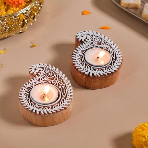 Give your house a glow-up with our tealight holders. 🕯️✨ Elevate your space and let the glow tell your story. 🌟 💖 Products included: 1. Wooden Block Decorative Candle Holder Set Of 2 2. Handmade Floral Mandala Tea Light Holder Set Of 2 3. Set Of 2 Mandala Wooden Block Candle Tea Light Holders 4. Set Of 2 Square Block Wooden Tea Light Holders 5. Floral Paisley Decorative Wooden Block Candle Holder Set Of 2 6. Wooden Paisley Block Candle Holder Set Of 2 7. Set Of 2 Elephant Candle Holders Wi... Lotus Tea Light Holder, Mandala Tealight Holder, Ceramic Lotus Candle Holder, Elephant Candle Holder, Lotus Flower Candle Holder, Wooden Tea Light Holder, Elephant Candle, Lotus Candle Holder, Block Candles