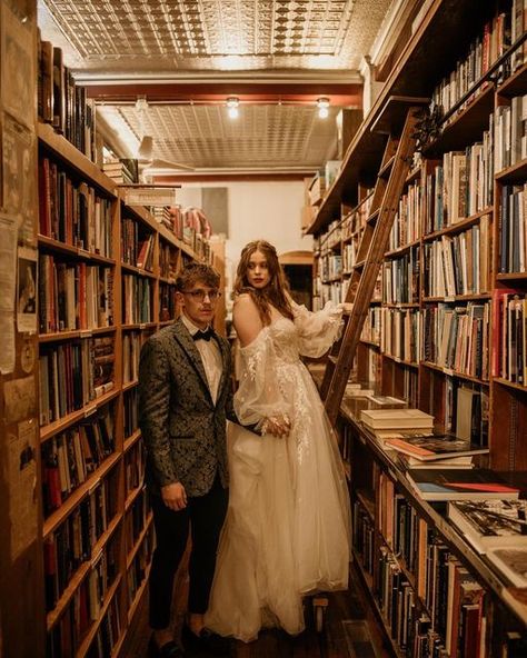 Elopement☽Wedding Photographer on Instagram: "The kind of love you only find in books… and this couple. More magic ✨ ⁣ Venue:⁣ @eltorreonkc Catering:⁣ @taylormadecateringkc ⁣Video: @austin.alan ⁣ #weddinday #vintagewedding #rainbow #rainbowbridephotos #rainbowweddingday #kcwedding #kansascitywedding #kcweddingphotographer #travelweddingphotographer #vintagebride #vintageweddingphotographer #eltorreon #bookstore #vintagebookstore #cottagecore" Engagement Photos In Bookstore, Old Library Wedding, Grocery Store Wedding Photos, Bookstore Wedding Photos, Bookstore Engagement Shoot, Bookstore Engagement Photoshoot, Engagement Photos Books, Wedding In A Library, Book Store Engagement Photos