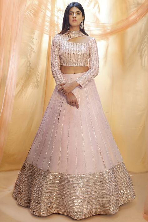 Featuring a lilac lehenga in dupion silk base with hand embroidery. It is paired with a matching blouse.  FIT: Fitted at bust and waist. COMPOSITION: Dupion silk. CARE: Dry clean only. Peacock Couture, Lilac Lehenga, Stylish Lehenga, Lilac Fabric, Indian Outfits Lehenga, Cutout Blouse, Lehenga Blouse Designs, Gaun Fashion, Pink Peacock