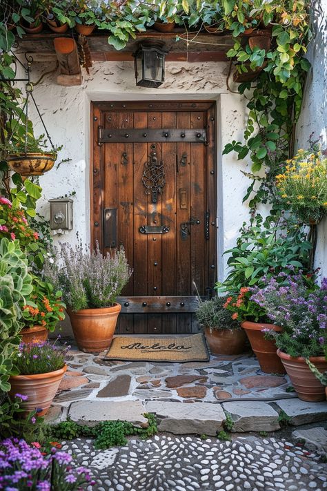 Charming Rustic Entryway: Explore Vintage Decor & Flourishing Greenery! Italian Villa Front Door, Cottagecore Front Door, Cottage Core Front Door, Vintage Door Knocker, Cottage Core Door, Swimming Pools Backyard Inground, Country House Exterior, Exterior Door Designs, Vintage Porch