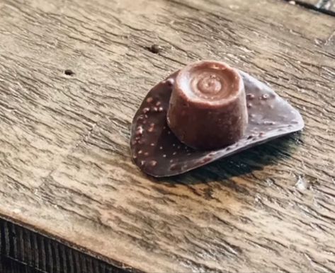 My guess is a chocolate covered Pringle Potato Chip with a Rollo candy on top? Cowboy Hat Cookies, Hat Cookies, Potato Chip, Potato Chips, Cowboy Hat, Chocolate Covered, Kids Party, Potato, Cowboy