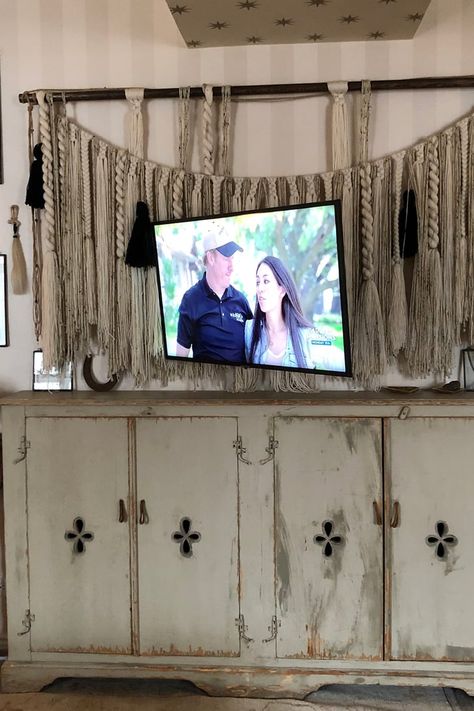 Drew Barrymore’s Creative Hack For Hiding Her TV Is Pretty Genius Tv Styling, Tv In The Bedroom, Tv Hidden, Chip And Joanna Gaines, Photo Caption, In The Bedroom, Drew Barrymore, Real Estate Tips, Easy Home Decor