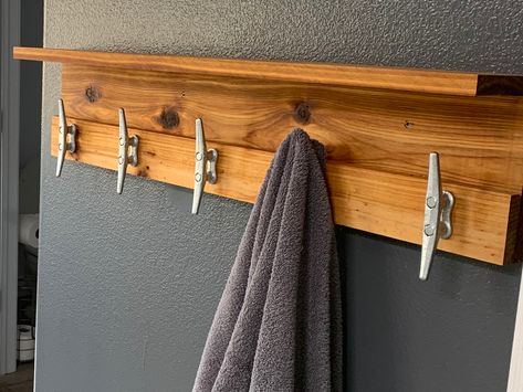 Hang towels with boat cleat Boat Cleat Ideas, Boat Cleats Ideas, Boat Cleats As Hooks, Boat Cleat Decor, Boat Cleat Towel Rack, Lakehouse Remodel, Towel Hanging Ideas, Cleat Storage, Lake Bedroom