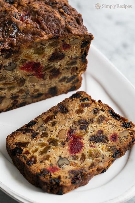 Fabulous holiday fruitcake recipe with dates, raisins, walnuts, glazed cherries, and orange zest.  Christmas fruitcake recipe. ~ SimplyRecipes.com Christmas Fruit Cake Recipe, Fruit Cake Recipe Christmas, Christmas Fruit Cake, Glazed Cherries, Fruit Cake Recipe, Fruit Cake Christmas, Heirloom Recipes, Fruitcake Recipes, Fruit Bread