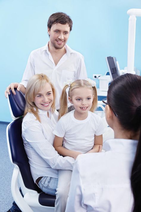 At the Dentist. Young family with a child in the dental office , #AFFILIATE, #family, #Young, #Dentist, #office, #dental #ad Dental Photos, Family Dentist, Dental Kids, Family Dental, Young Family, Dental Office, Vector Images, Medical, Stock Images