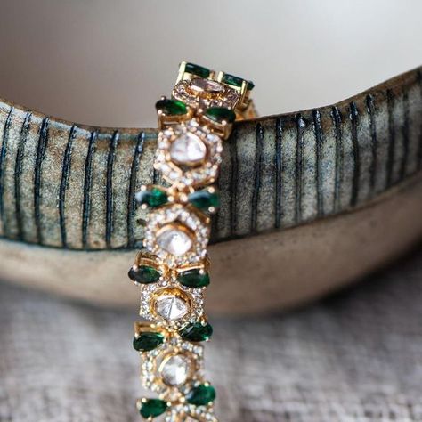 R Narayan Jewellers on Instagram: "A timeless curation of polki with small uncut diamonds & emeralds in a bracelet that epitomizes style, grace and regality and can be passed on for generations 🙌🏼

Featuring our 18 carat vilandi Bracelet ✨

Styling credits : @uneesbees 
Photography: @chanakyav 

.
.
#rnarayanjewellers #indianjewellery #luxurybrandindia #goldjewellery #traditionaljewellery #indianweddings #indianjewels #jewelsofinstagram #traditionaljewelry #customizedjewellery #designerjewellery #vadodara #loveforjewelry #weddingjewelry  #contemporaryjewelry #finejewels #baroda #handcraftedjewellery #barodacity #diamondsareforever #goldjewelleryindia #emerald #diamondbracelet #polkilove #polki #modernindian #heirloom #indiandiamonds" Bracelet Styling, Gold Jewellery India, Jewelry Wishlist, A Bracelet, Uncut Diamond, Fine Jewels, Traditional Jewelry, Contemporary Jewelry, Indian Jewellery