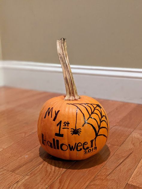 Baby's first Halloween Spider pumpkin decorating Halloween Pumpkin Decorating Ideas, First Halloween Pumpkin, Halloween Pumpkin Decorating, Decorating Halloween, Pumpkin Decorating Ideas, Baby Boy Halloween, Creative Pumpkin Carving, Newborn Halloween, 1st Halloween