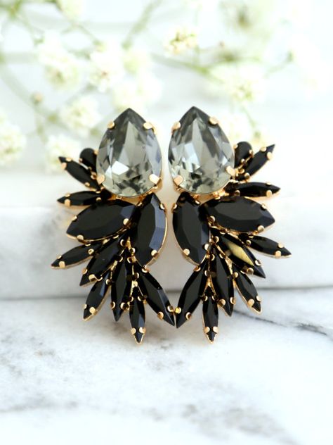 On Sale, Holiday Sale     Champagne Statement Earrings,Bridal Earrings, Swarovski Bridal Earrings,Cocktail Earrings,Big Earring, cocktail earrings, Wedding Earrings Black Statement Earrings,Black Earrings, Swarovski Bridal Earrings,Cocktail Earrings,Big Earring, Black Gold cocktail earrings,Gray Earrings  Dazzling post Crystal earrings feature a Pear shape crystal set on a secure prong settings. The perfect shade for cocktail parties or to add a touch of color to your wedding ensemble  Petit... Earring Tops, Black Statement Earrings, Black Crystal Earrings, Cocktail Earrings, Gray Earrings, Black Gold Jewelry, Earrings Big, Gold Cocktail, Crystal Stud Earrings