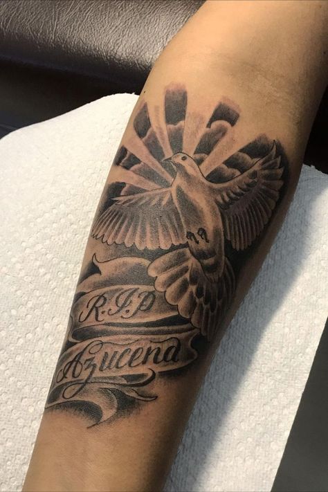 Want to know some of the best memorial tattoo ideas? We prepared the 40 rip grieving ideas and their significance for people who want such tattoos. Rip Tattoo Ideas, R.i.p Tattoos For Men, Lost Loved Ones Tattoo, Rip Tattoos For Dad, Rip Tattoos, Memorial Tattoo Quotes, Rip Tattoo, Outer Forearm Tattoo, Heaven Tattoos