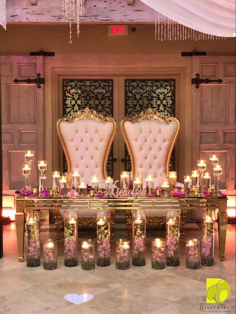 The sweetest gold, pink & purple sweetheart table with lots of floating candles| #wedding #bride #weddingdecor #weddingdecorator #weddingday #weddingideas #weddinginspiration #sweet #sweetheart #prewedding #couple #fashion #bridal #bridetobe #party #groom #purple #pink #gold #engagement #florals #candles #fashion #crystals #bodas #florida #photography #flowers #petals Sweetheart Table Wedding With Candles, Bride And Groom Table With Candles, Candle Lit Sweetheart Table, Pink Sweetheart Table Wedding, Sweetheart Table Wedding Ideas, Purple Sweetheart Table, Wedding Sweetheart Table Ideas, Sweetheart Table Candles, Romantic Sweetheart Table