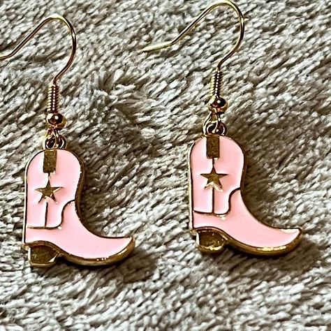 Western Charm: Dainty Handmade Pink Cowboy Boot Earrings - Cowgirl Jewelry #CowgirlEarrings #CowboyRodeoJewelry #CuteTrendyEarrings #GoldSilverEarrings #CowgirlStyle #GiftsForHer #HandmadeDainty #SpecialRodeoGirl #WesternStyle #EarringsEveryday Cowboy Boots Jewelry, Cowgirl Hat Earrings, Pink Cowboy Boot, Cowgirl Hat Earrings Pink, Cowboy Boot Pendant, Cowboy Boot Earrings, Cowboy Boot Charm Necklace, Boot Earrings, Rodeo Jewelry