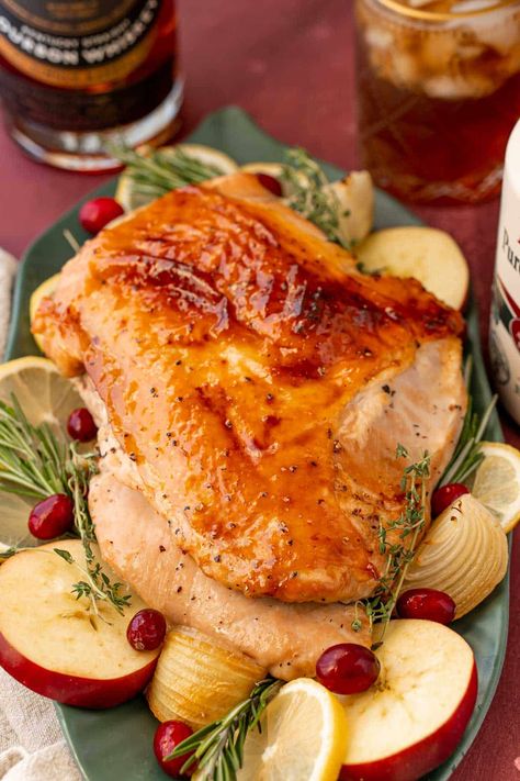 This Maple Bourbon Glazed Turkey Breast Recipe makes a moist, juicy turkey that's bursting with delicious smoky, sweet flavor in every bite! A great choice for the holidays! Maple Bourbon Turkey, Glazed Turkey Breast, Bourbon Turkey, Maple Bourbon Glaze, Turkey Breast Recipes, Glazed Turkey, Slow Cooker Turkey Breast, Juicy Turkey, Bourbon Glaze