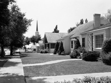 Shown above is a black and white 1950's suburban street. This is used to represent the Finches' home. In their neighborhood, they grew up and matured. It is a tightly knit neighborhood, and they learn the secrets of their neighbors. Miss Stephanie Crawford is the town gossip, giving the town an opinion the same as her own. The Radleys isolate themselves and refuse to go with social norms. Stony Brook University, 1950s House, Health Administration, Time Life, Occupational Health And Safety, West Lake, Black American, Vintage Ads, White House