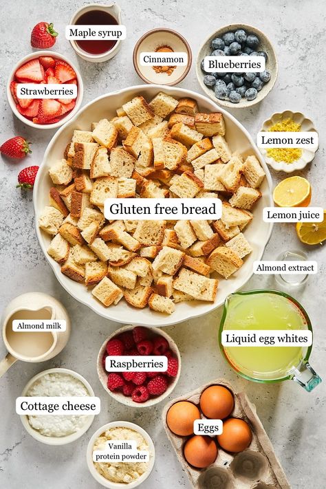 If you’re looking for the perfect breakfast to serve on Christmas morning, Mother’s Day, or at an upcoming holiday brunch, look no further than this gluten-free Protein French Toast Casserole! It’s the perfect make-ahead dish. Simply prep the night before, and pop it in the oven the next morning for a stress-free, high protein breakfast that your whole family will love. Even better, this french toast packs 19 grams of protein per slice! Breakfast Casserole Protein, Protein French Toast Casserole, French Toast Oven, High Protein Breakfast Casserole, High Protein French Toast, Protein French Toast, Baked French Toast Casserole, Cottage Cheese Eggs, Ezekiel Bread