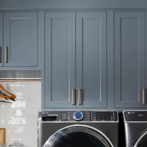 Katie | Nashville Interior Designer on Instagram: "LAUNDRY ROOM REVEAL✨  this laundry room is one heck of a before and after!!! We reconfigured the layout to put the sink at the window and gain lots more storage!   We also changed the color scheme (bye yellow walls👋🏻) and did a brick look herringbone tile on the floors, which is one of my favorite parts of this full home reno!!   Swipe to see the before photos➡️  . . . . . #laundryroomdesign #laundryroomrenovation #laundrygoals #laundryroom #laundry #renovating #beforeandafter #interiors123 #nashvilleinteriordesign #nashvilledesigner #howwedwell #howihaven #houseenvy #currentdesignsituation #transformation" Black Washer Dryer, Blue Laundry Room, Blue Laundry Rooms, French Country Blue, Laundry Cabinets, Modern French Country, Laundry Room Renovation, Herringbone Tile, Yellow Walls