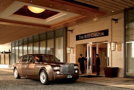 Rolls Royce parked in front of the hotel entrance with two doormen standing in attendance Tokyo Midtown, Tokyo Hotel, Hotel Exterior, Hotel Entrance, Hotel Packages, Roppongi, Hotel Chain, Tokyo Hotels, The Ritz Carlton