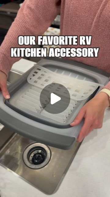 Chris & Amanda | Fulltime RV Travel Family on Instagram: "Don’t do dishes in an RV without this! 🧼  You don’t have a ton of extra space in an RV so it’s important that you buy things that have multiple uses or can easily fold up and be stored away.  That’s exactly what this kitchen accessory does!  When it’s time for dishes, we unfold it and put it on the other half of our double sink.  Once the dishes are dry and put away we simply fold it and store it back under the kitchen counter!  Comment “DISHES” for a link to the one we use!  #rvaccessories #rvproducts #rvtips #camping #rvmusthaves #campingneeds #campingtrip" Rv Kitchen Sink Remodel, Camper Dish Storage, Washing Dishes Camping, Rv Sink Replacement, Rv Dish Drying Rack, Camper Organization Travel Trailers, Rv Kitchen, Camper Organization, Camping Needs