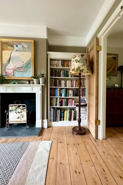 contemporary rug and antique lamp with paintings combine to make eclectic living space Persian Rug Industrial Interior, Red Vintage Rug Living Room, Stiffel Floor Lamps Vintage, Bristol London, Antique Brass Floor Lamp Vintage, Red Persian Rug Study, Project House, Antique Lamp, Eclectic Living