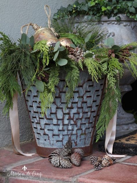 vintage olive bucket with greens pine cones and brass bells gorgeous holiday christmas decor Olive Bucket, Holiday Scented Candles, Simple Holiday Decor, French Country Christmas, French Christmas, Christmas Entertaining, Country Christmas Decorations, Gold Christmas Decorations, Christmas Front Porch