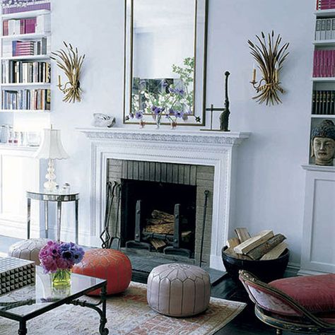 Poufs in front of fireplace Mantel Styling, Mediterranean Living Room, Nyc Apt, Turkish Tiles, White Fireplace, Casa Vintage, Eclectic Living Room, Moroccan Pouf, Bohemian Living