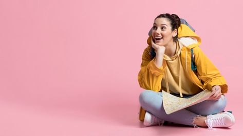 Happy tourist sitting on the floor while... | Free Photo #Freepik #freephoto #woman #person #adventure #tourism Looking At A Map Pose, Person Sitting On Edge Of Building, Adventure Tourism, David Beckham, On The Floor, The Floor, Free Photo, Free Photos, Hold On