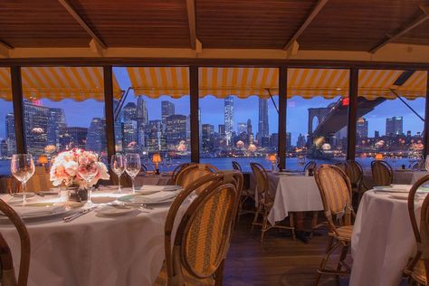 Views of the Manhattan skyline and Statue of Liberty provide a stunning backdrop at the River Café, a Brooklyn institution for nearly 40 years, which sits at the base of the Brooklyn Bridge. Guests dine on chef Brad Steelman’s acclaimed New American cuisine, while a pianist provides a romantic soundtrack to the meal. It’s little wonder that marriage proposals are a frequent occurrence. therivercafe.com Cafe Nyc, Nobu Malibu, Central Park Weddings, Restaurant Photos, Waterfront Restaurant, Manhattan Skyline, Malibu California, American Restaurant, Fall Travel