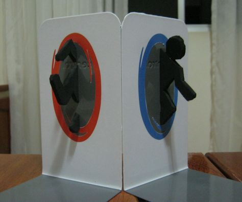 Portal bookends Portal Room, Gamer Crafts, Gamer Bedroom, Portal Game, Portal 2, Computer Game, Video Gaming, Diy Home Furniture, Gaming Decor