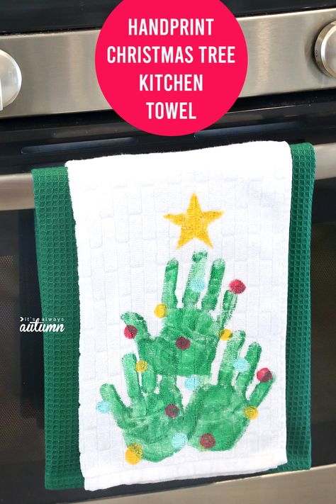 This adorable handprint Christmas tree kitchen towel makes a great gift for grandparents! Christmas Tree Kitchen, Baby Christmas Crafts, Handprint Christmas Tree, Grandparents Christmas Gifts, Grandparents Christmas, Handprint Christmas, Toddler Christmas Gifts, Christmas Gift Basket Ideas, Christmas Gifts For Parents