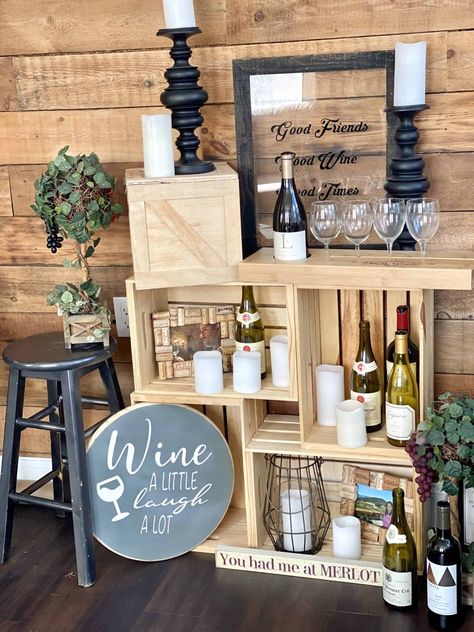 Get yourself some wood crates and turn them into this beautiful DIY wine rack. These wood crate shelves can hold wine bottles, glasses, candles, and photos. These wine themed decorating ideas are so easy and are sure to impress your guests! #woodcrates #winebottlecrafts #winerack Wine Stomping, Remove Wine Bottle Labels, Wine Serving Trays, Wine Cork Coasters, Kay Kay, Wine Cork Projects, Wine Bottle Centerpieces, Bottle Centerpieces, Cork Projects