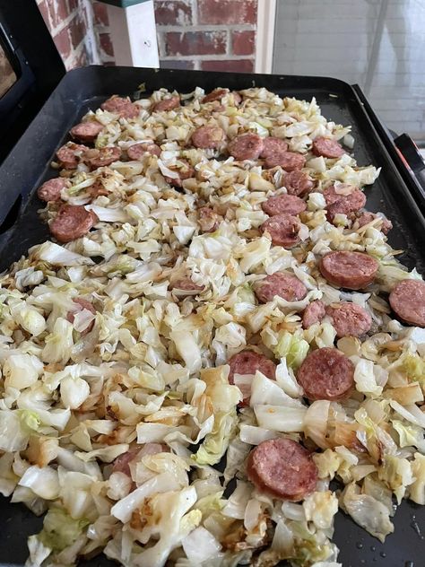 Blackstone Recipes ONLY!!! | Cabbage, onions, bacon and sausage dinner Blackstone Cabbage Recipes, Cabbage Blackstone, Blackstone Cabbage, Cabbage On Blackstone Griddle, Blackstone Grill Recipes Keto, Keto Blackstone, Cabbage Burger, Blackstone Recipe, Cabbage And Smoked Sausage