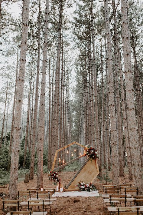 Intimate wedding in the woods inspiration in Emmy Mae Bridal | Wedding amongst the pines | Forest Wedding | Modern Rustic Wedding | Romantic Rustic Wedding | Lace Fitted Wedding Gown | Lush moody wedding florals | Plunging neckline wedding dress | Unique ceremony altar | Geometric wood altar piece | beautiful wedding ceremonies | Venue: Pinewood Weddings and Events | Photography: Kate Becker | Florals: Pristine Floral | Minneapolis Wedding | #aandbebridalshop #emmymae Moody Wedding Florals, Plunging Neckline Wedding Dress, Forest Wedding Ceremony, Ceremony Altar, Modern Rustic Wedding, Fitted Wedding Gown, Wedding Outside, Neckline Wedding Dress, Forest Theme Wedding