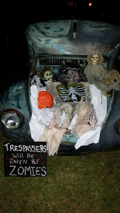 Zombie trunk! Add gross out / touch and feel boxes to increase the scare factor! Hospital Trunk Or Treat, Disney Zombies Trunk Or Treat, Zombie Trunk Or Treat Ideas For Cars, Zombie Trunk Or Treat, Monster Trunk Or Treat, Trunk Or Treat Monster, Trunk Or Treat Candy Monster, Cheap Trick Or Trunks, Baby Trunks