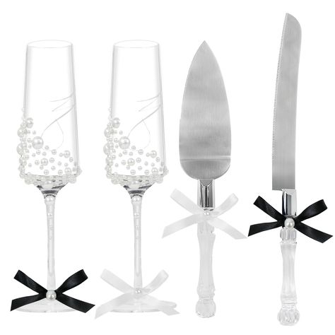 PRICES MAY VARY. 【Elegant Glasses and Knives Set】: Includes 1 cake serrated knife, 1 cake server, and 2 wedding toasting flutes that feature a ribbon and pearl embellishment.These elegant champagne glasses will add a touch of glamour to your special day and make your toast truly memorable. 【Personality & Perfectly】-If you’re looking for something classic and chic, our silvery pearl set is perfect. The champagne flutes are made of glass and feature a elegant silk bow and pearl embellishment, whil Bride And Groom Champagne Flutes, Pearl Champagne Flutes, Wedding Utensils, Bride And Groom Wine Glasses, Elegant Glasses, Wedding Cake Server Set, Cake Knife Set, Serrated Knife, Wedding Cake Knife