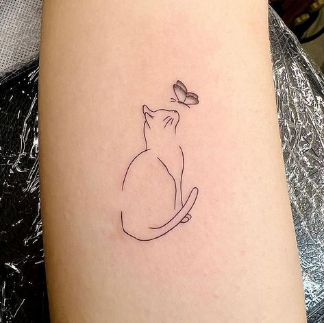 Feline Tattoo Ideas, Cat Tattoo With Name, Fine Line Cat Tattoo Ideas, Personal Cat Tattoo, Memorial Tattoo For Cat, Meaningful Cat Tattoos, Tattoo Ideas For Cats, Cat With Butterfly Tattoo, Delicate Cat Tattoo