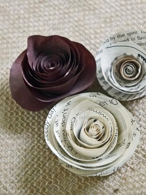 Paper flowers fashioned from old book pages, newspaper or brown Kraft paper are a frugal alternative to store-bought ribbons and bows. Neli Quilling, Old Book Crafts, Rolled Paper Flowers, Crafting Inspiration, Easy Paper Flowers, Book Page Crafts, Paper Flower Crafts, Newspaper Crafts, How To Make Paper Flowers