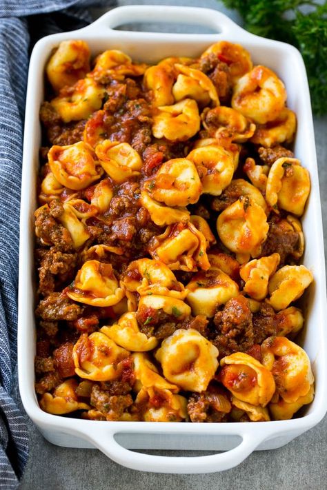 A dish of cheese tortellini tossed in meat sauce. Baked Tortellini Recipes, Baked Tortellini, Dinner Sandwich, Recipe With Ground Beef, Homemade Meat Sauce, Tortellini Bake, Meat Sauce Recipes, Tortellini Recipes, Tortellini Pasta