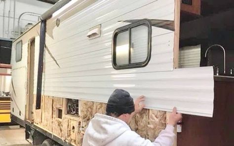 Are you in the market for a camper? If so, you’re probably neck-deep into RV research, including their basic construction and the various types of camper siding options. If you’re just beginning your search, however, you might be wondering: What is RV siding made out of? RV siding is typically made out of either aluminum or fiberglass; and while these are the most common materials used, not every RV is made the same. Fiberglass RVs are made from both laminated and molded fi... Camper Exterior, Diy Travel Trailer, Fiberglass Camper, Camper Flooring, Exterior Wall Panels, Siding Ideas, Rv Exterior, Exterior Wall Materials, Siding Options