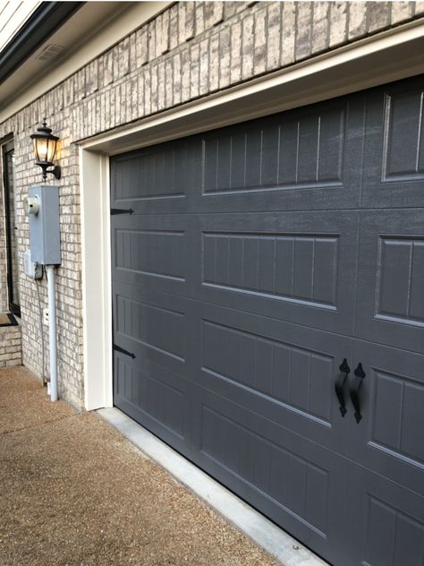 Factory painted Sherwin Williams Peppercorn on garage door, SW Natural Linen on trim, Acme Mossy Oak brick.  Peppercorn was listed as a neutral on paint options, but truly has a violet undertone. Gray Garage Door, Paint Garage Door, Grey Garage Doors, Gray Garage, Grey Brick Houses, Garage Door Trim, Garage Door Colors, Metal Garage Doors, Garage Door Paint