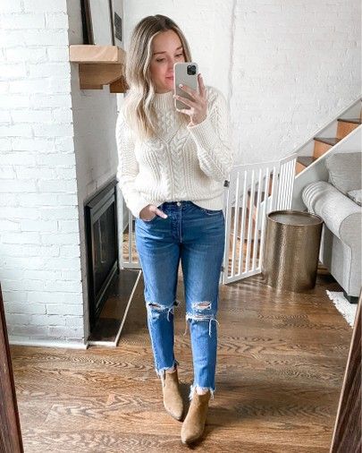 Cream Turtleneck Sweater Outfit, Sweater Dress With Cream Bootie Boots, Sweater With Ripped Jeans Outfit, Creme Sweater Outfit, Fall Cream Closed Toe Booties, Cream Turtleneck Sweater For Fall, Cream Mock Neck Sweater Outfit, Sweater Jeans Booties, Beige Booties Outfit