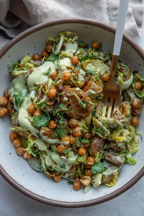 Baked Shredded Brussels Sprout Salad with Smashed Potatoes - Plant Based RD Smashed Potatoes And Brussel Sprouts, Shredded Brussel Sprout Recipes, Smashed Baked Potatoes, Smashed Potatoes Baked, Baked Brussel Sprouts, Shredded Brussel Sprout Salad, Brussels Sprout Salad, Creamy Avocado Dressing, Sprout Salad