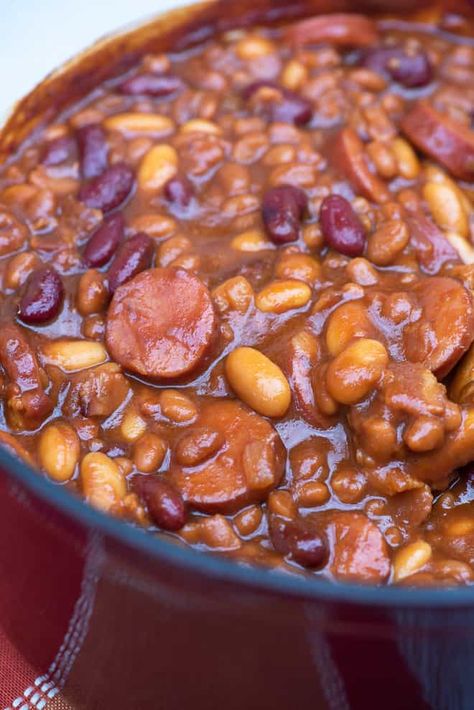 These Kielbasa Baked Beans make for a hearty and flavorful summer side dish or spoon them over rice for an easy, satisfying meal. #bakedbeans #easybeans #kielbasabeans #kielbasa #summerrecipes #potluckrecipes Kielbasa And Beans, Kielbasa Sausage Recipes, Sausage Dinners, Batter Bread, Baked Beans From Scratch, Calico Beans, Canned Baked Beans, Baked Beans With Bacon, Bbq Baked Beans