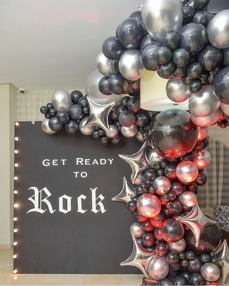 Rock n Roll party balloon arch Rockstar Decorations Party, 80s Rock Band Party Ideas, Rock Birthday Decoration, Rock Music Theme Party, Rock Star Balloon Garland, Rock Through The Ages Party, Rock And Roll Table Centerpieces, Glam Rock Birthday Party Ideas, Heavy Metal Birthday Party Decorations