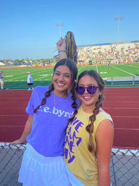 football game outfit inspo cheer stands spirit school purple gold yellow hair bubble braids team pose Purple And Gold Spirit Day Outfits, Blue And Gold School Spirit Outfit, Blue And Gold Spirit Week Outfits, Gold Spirit Day, Blue And Gold Day Spirit Week, School Spirit T-shirt For Game Day In Spring, Hair Bubble Braids, Purple And Gold School Spirit, Spirit Day