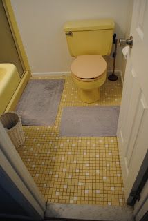 Budget Bathroom Makeover: Embracing the ’60s Yellow: hang shower curtain higher than tub to cover Yellow Tile Bathroom Ideas, Yellow Tile Bathroom, Vintage Yellow Bathroom, Yellow Bathroom Tiles, Yellow Bathroom Walls, Yellow Grey Bathroom, Makeover Kamar Mandi, Brown Bathroom Ideas, Yellow Bathroom Decor