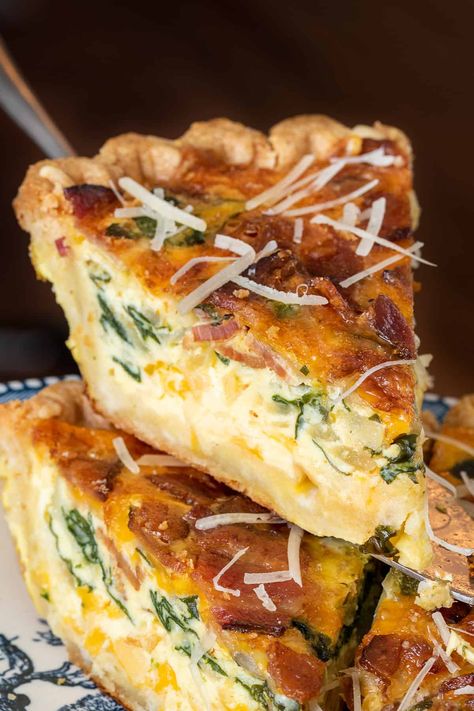 My easy Spinach Bacon Quiche is a classic breakfast dish loaded with fresh spinach, crispy bacon, and a gooey blend of Gruyere and Cheddar cheese, in a buttery, flaky crust! Spinach And Bacon Quiche, Spinach Bacon Quiche, Breakfast Quiche Recipes Easy, Bacon Spinach Quiche, Cooked Spinach, Spinach And Bacon, Recipe Spinach, Cheesy Spinach, Breakfast Quiche Recipes