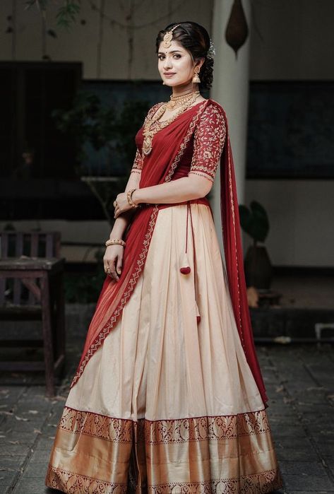 South Indian Style Half Saree, Traditional Dhavani Set, Grand Half Saree For Wedding, Red Pattu Half Saree, Traditional Dresses For Engagement, South Indian Langa Voni, Simple Davani Half Saree Kerala, Kerala Traditional Half Saree Designs, Lehanga Simple Blouse Designs