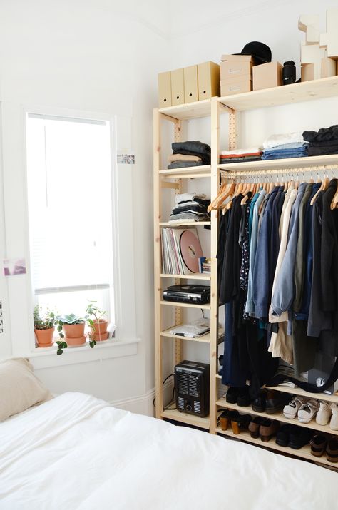 MJ's bedroom lacks a closet as well, so an IKEA IVAR shelving unit holds her clothes, shoes, and accessories. Open Closet Storage, Ikea Ivar Shelves, Makeshift Closet, Ivar Regal, Små Rum Lidt Plads, Small Closet Space, Apartment Needs, Ikea Closet, Open Wardrobe