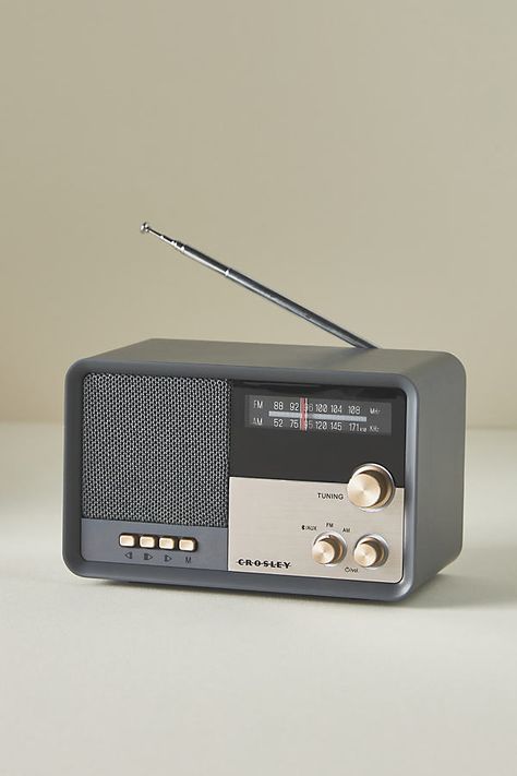 Ideal for small spaces, this radio pairs a modern silhouette with vintage-inspired details. Best of all? Its Bluetooth functionality means you can stream your favorite songs from any device. Anthropologie Gifts, Small Radio, Crosley Radio, Disney Coffee Mugs, Retro Radios, Retro Gadgets, Retro Radio, Old Radios, Modern Music